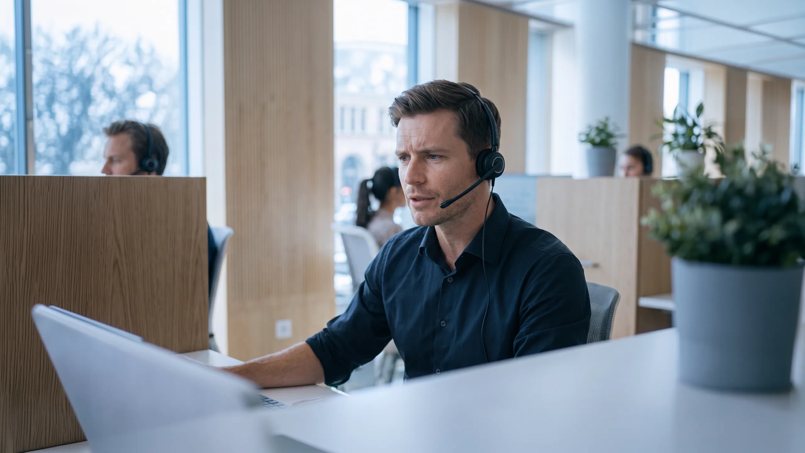 An operator in the response center answering a call